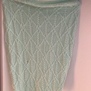 Used, but in really good condition. Sweater